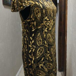 Raiment Fashions, Inc.  Gorgeous Black and Gold  size Large woman's evening gown